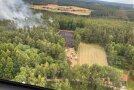 Feuerwehr löscht einen Waldbrand
